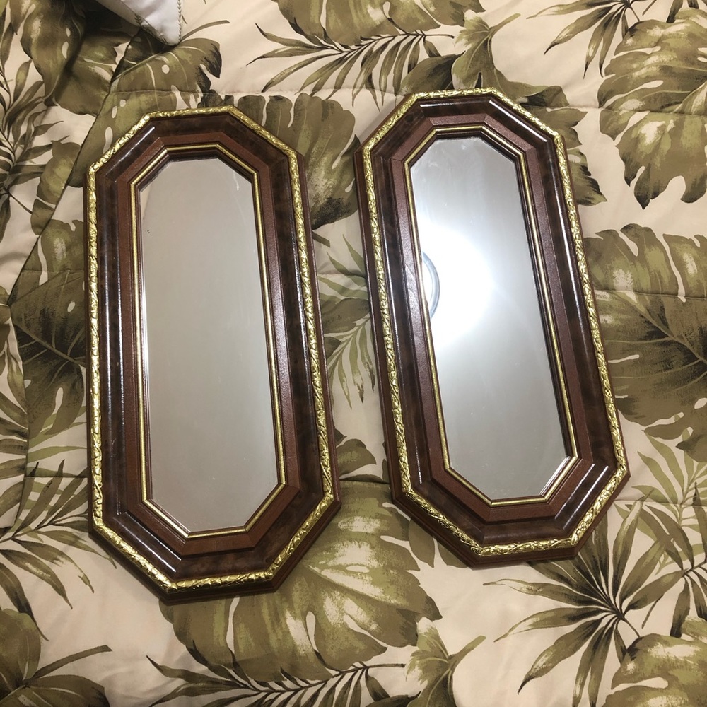 Matching mirrors with gold accent
